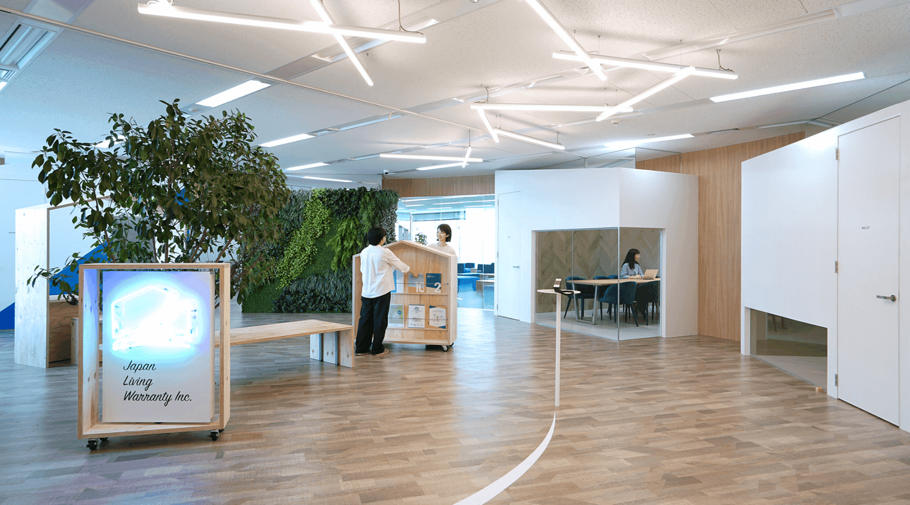 さまざまな「おうち」が建ち並び、公園の緑が豊かにつながるオフィスデザイン